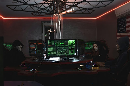People working together to hack into a computer system