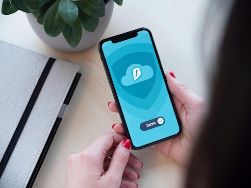 Person holding a blue and black iPhone