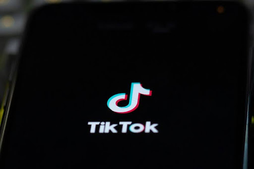 TikTok logo on a sign, symbolizing the app’s uncertain status in the U.S.