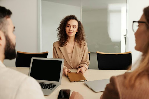 Woman sitting at a table during a job interview