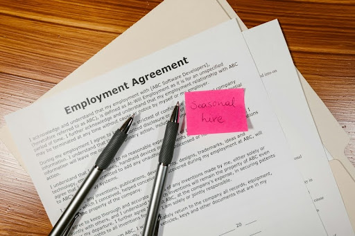 Employment agreement paper with a pen on a desk