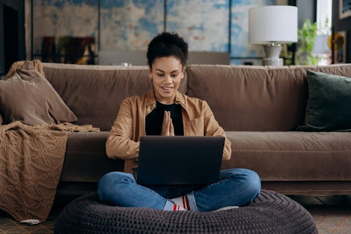 Woman using a laptop at home