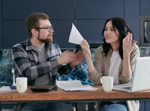 Man and woman having a workplace conversation