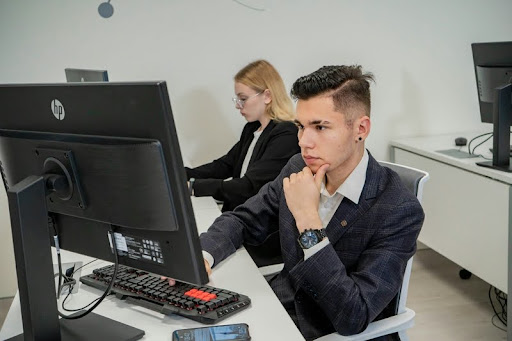 Man working at a desk on a computer