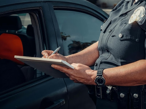 Policewoman writing on a notepad