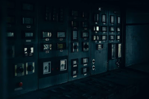 Industrial control wall with monitoring systems, gauges, and dials