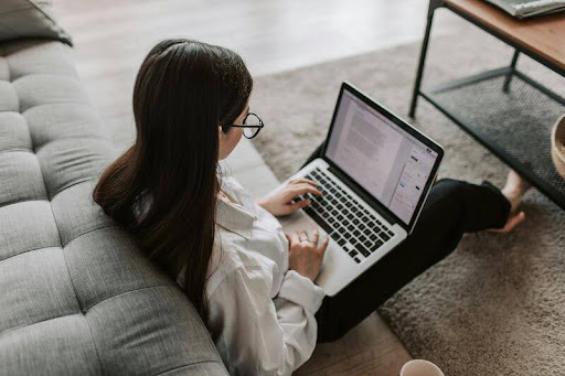 Woman using a laptop indoors