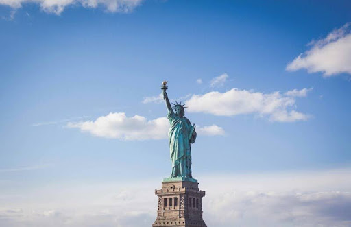 Statue of Liberty with blue sky in the background