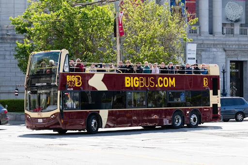 Double-decker tour bus driving through San Francisco