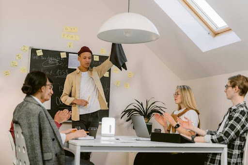 Person presenting a business idea with a whiteboard in the background