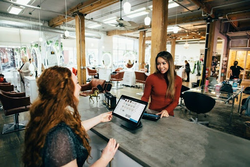 Two women having a focused conversation at a table