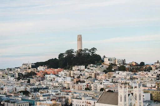 Coit Tower overlooking city buildings in San Francisco