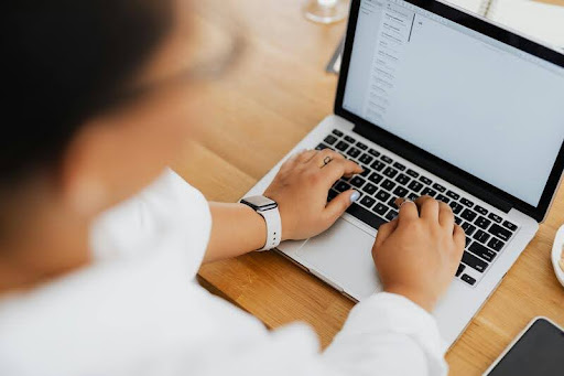 Woman using a laptop indoors