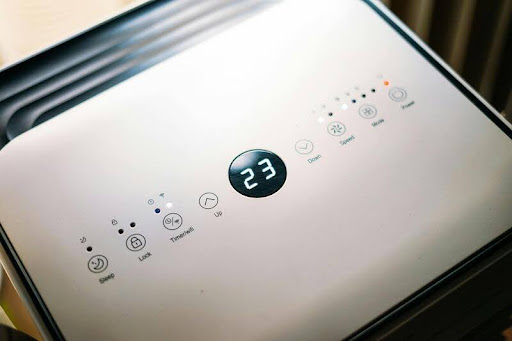 Modern smart air conditioner control panel with ambient intelligence features.