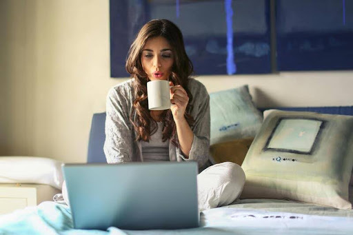 Woman using a laptop at home