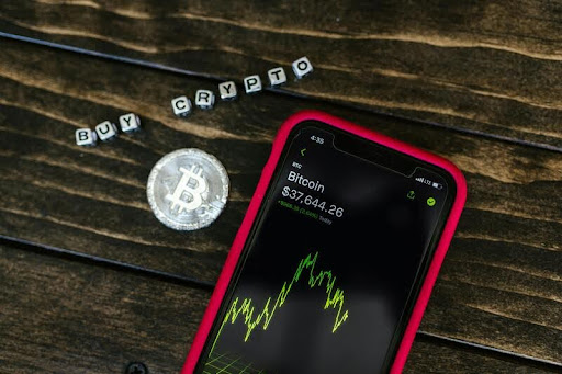 A glimpse into everyday Web3—Phone on a table displaying a crypto wallet app interfacemanaging digital tokens from the palm of your hand.