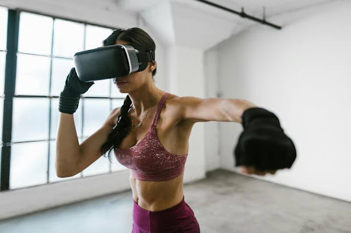 Woman exercising with a VR headset on