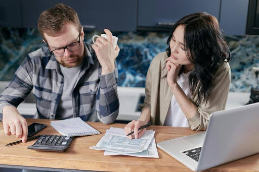Two women working together in an office.
