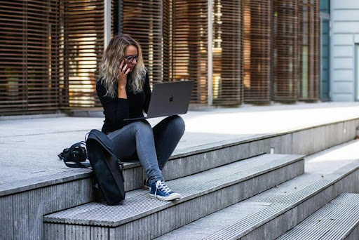 Woman using a laptop at home
