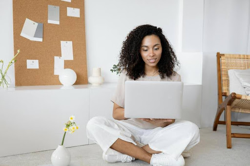 Woman using a laptop at home