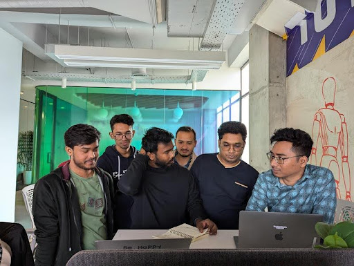 Group of men working together in a modern office space