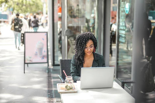 Woman working on a laptop at a desk