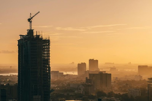 City skyline with a construction crane in the foreground