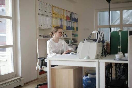 Woman researching loan options on a computer