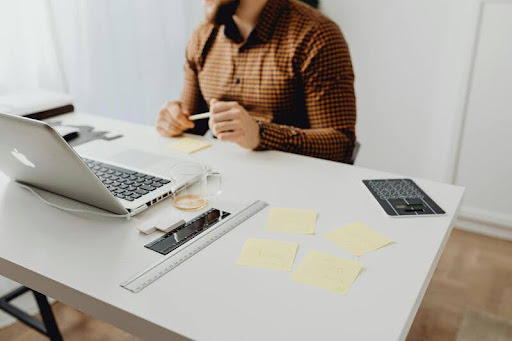Woman working at her desk in a modern office setting