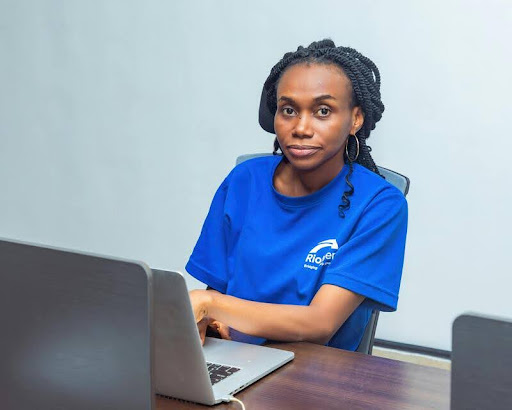 Student using a laptop to research student loan options